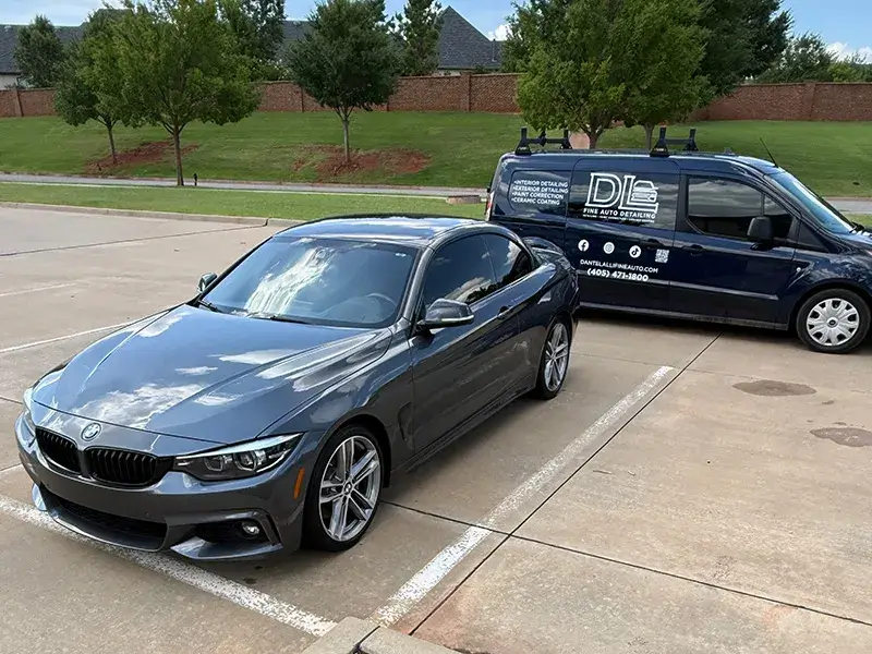 Explore Our Services BMW parked next to DL Fine Auto van