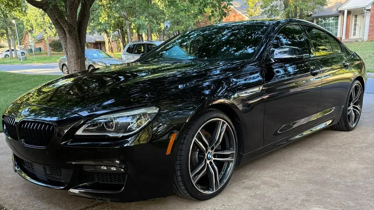 Black vehicle after paint correction