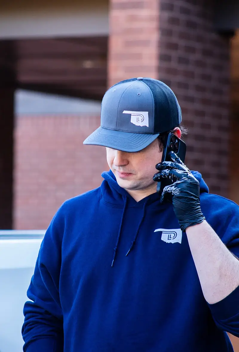 Dante on the phone with a client