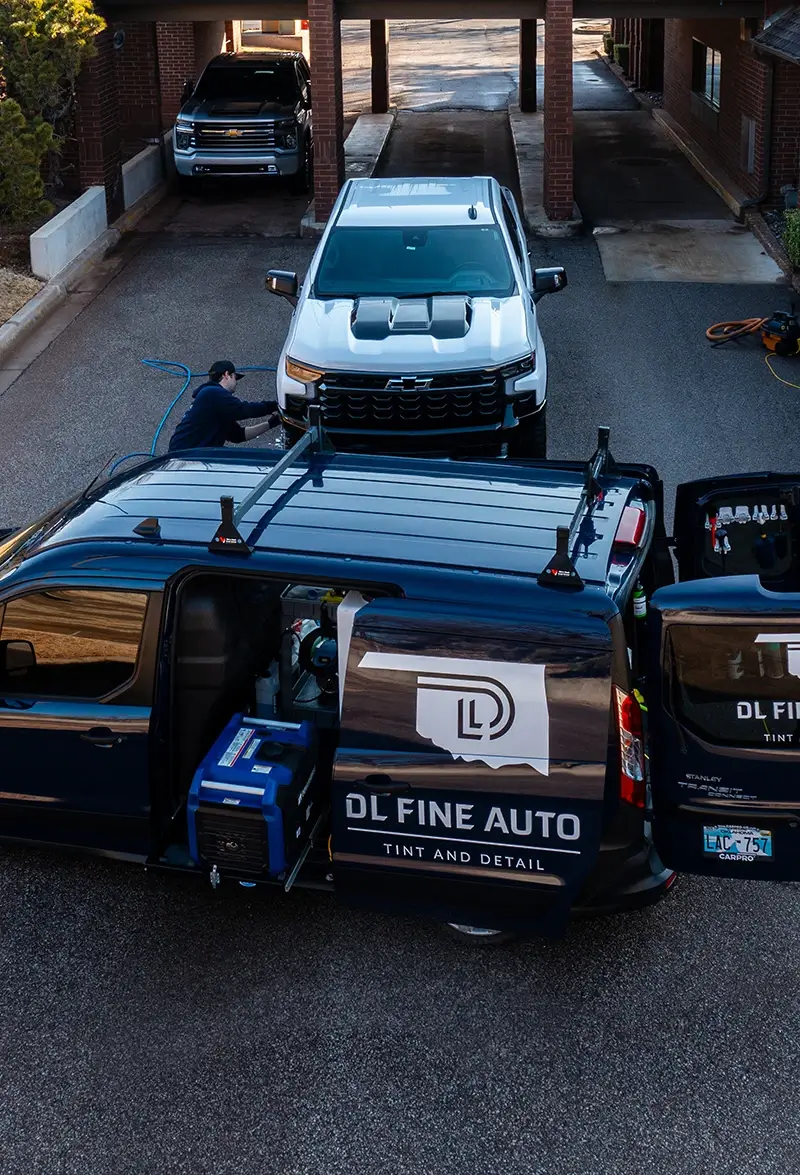 Cleaning truck next to mobile service van