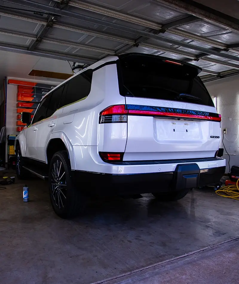A white SUV with tinted windows
