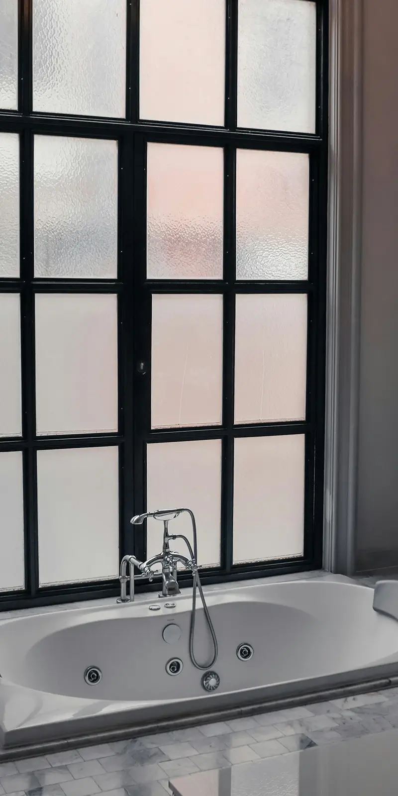 bathroom-glass A frosted bathroom window