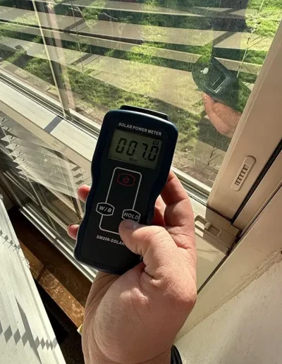 A solar power meter reading 007.0 after window being tinted