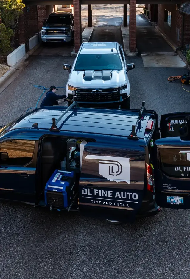 Cleaning truck next to mobile service van